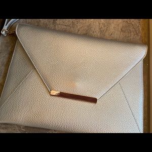 NWOT! White House Black Market Silver Clutch